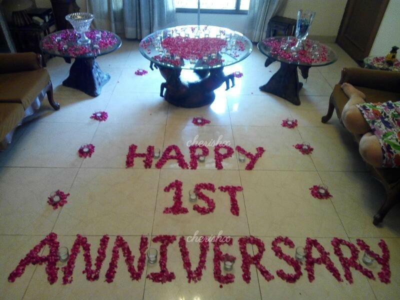 Wish anniversary to your wife or husband with a movie surprise with this loving rose petal decor.
