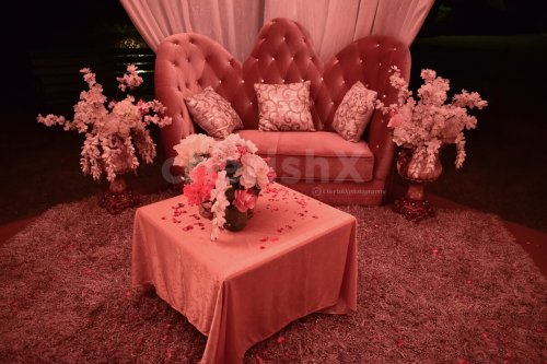 A gorgeous sofa set up in the cabana for a romantic date.