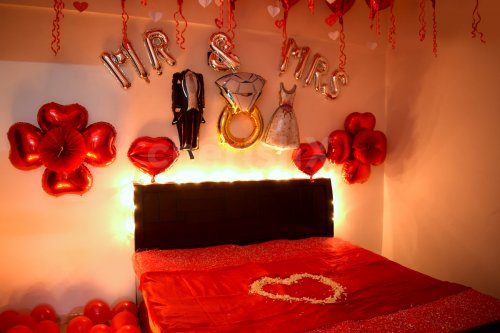 Get a decoration like this in your room by booking CherishX's First Night Wedding Decoration in Bangalore.