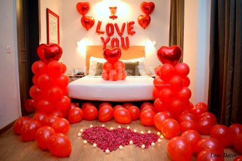 Attractive Red Balloon Room Decoration to celebrate your anniversary or to propose your love.