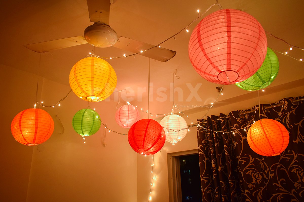 Embellish these Delicate Paper Lanterns into your room by booking CherishX's Colourful Lantern Decor.