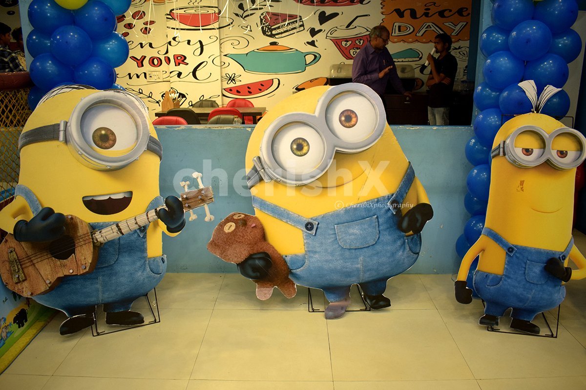 The cut-outs are of three minions that are added to the birthday room decor of your kid!