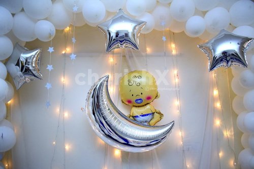 Baby Face Foil Balloon with a moon foil balloon