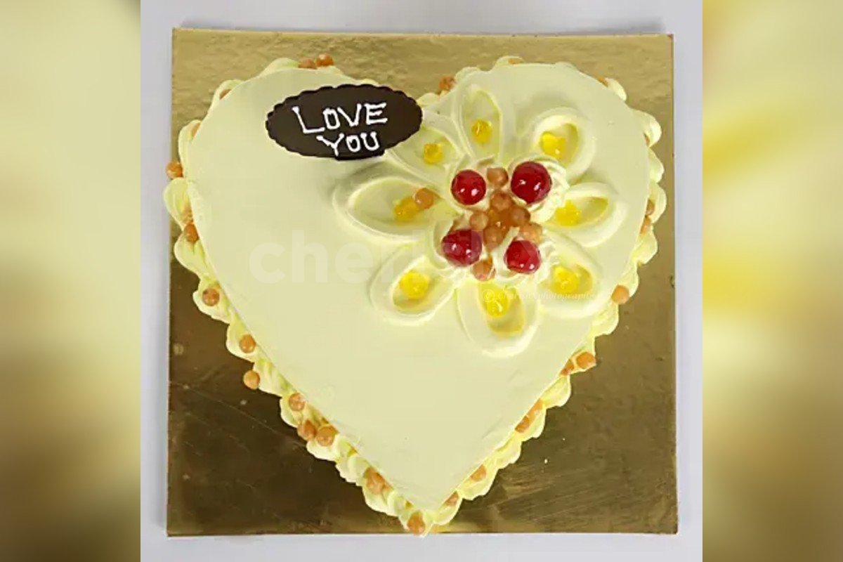 Fresh Heart shape Butterscotch cake delivered to your home by cherishx