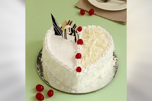 Delicious white forest heart shape cake