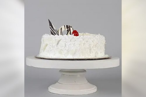 Delicious white forest heart shape cake delivered to your home