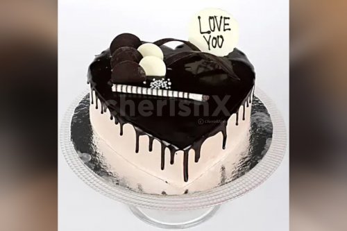 Heart shape chocolate cream cake delivery at home