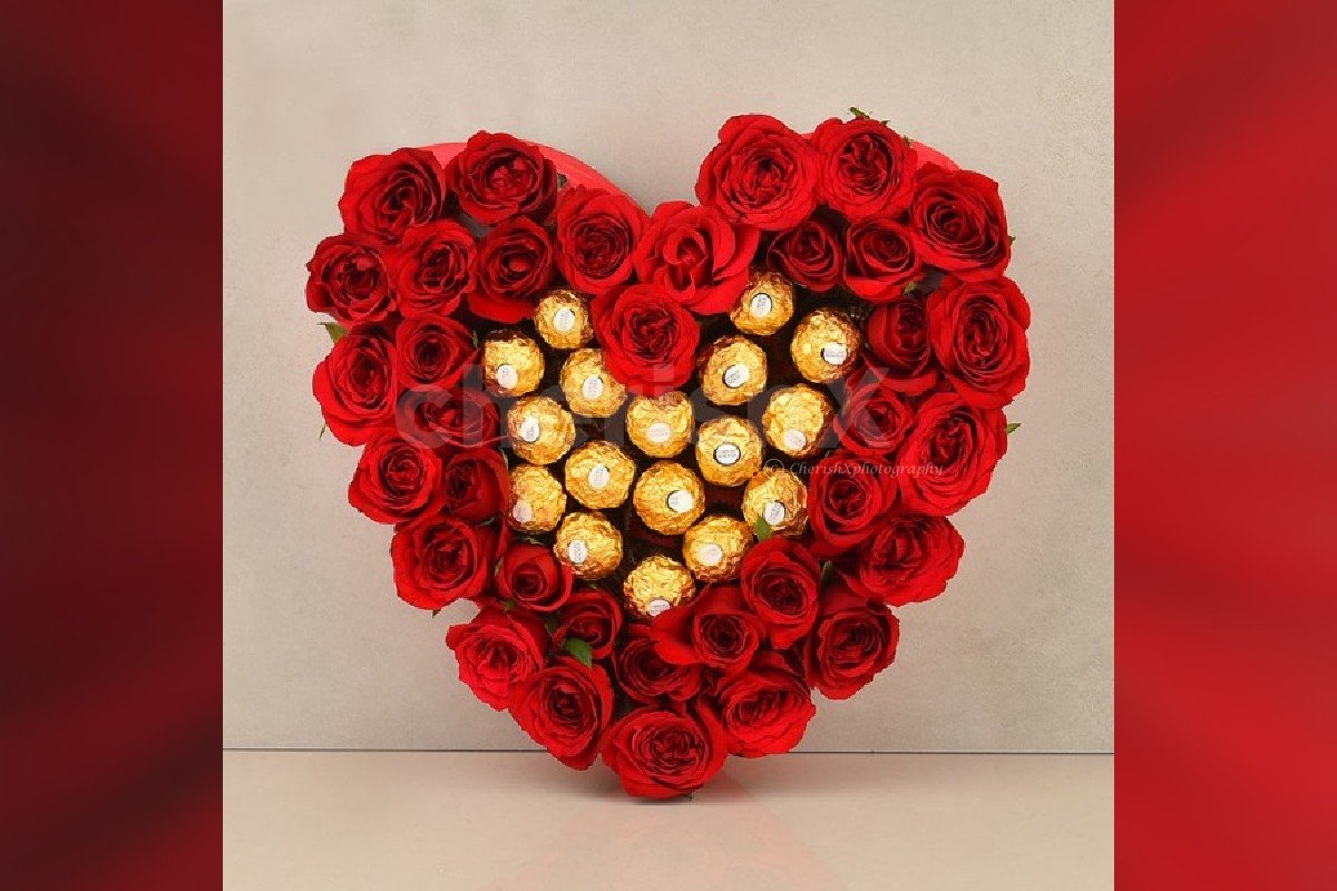 Beautiful Red roses and ferrero rocher heart arrangement 