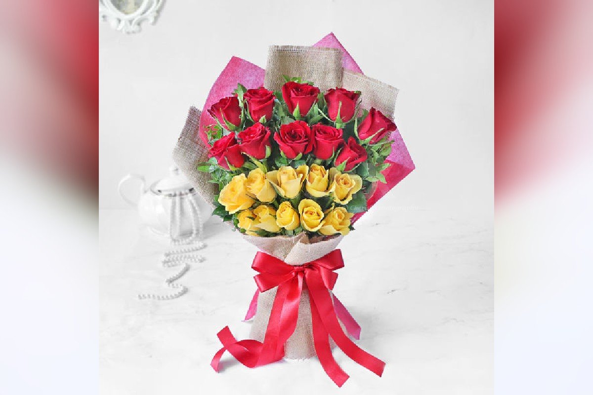 20 red and yellow roses bouquet with teddy online delivery