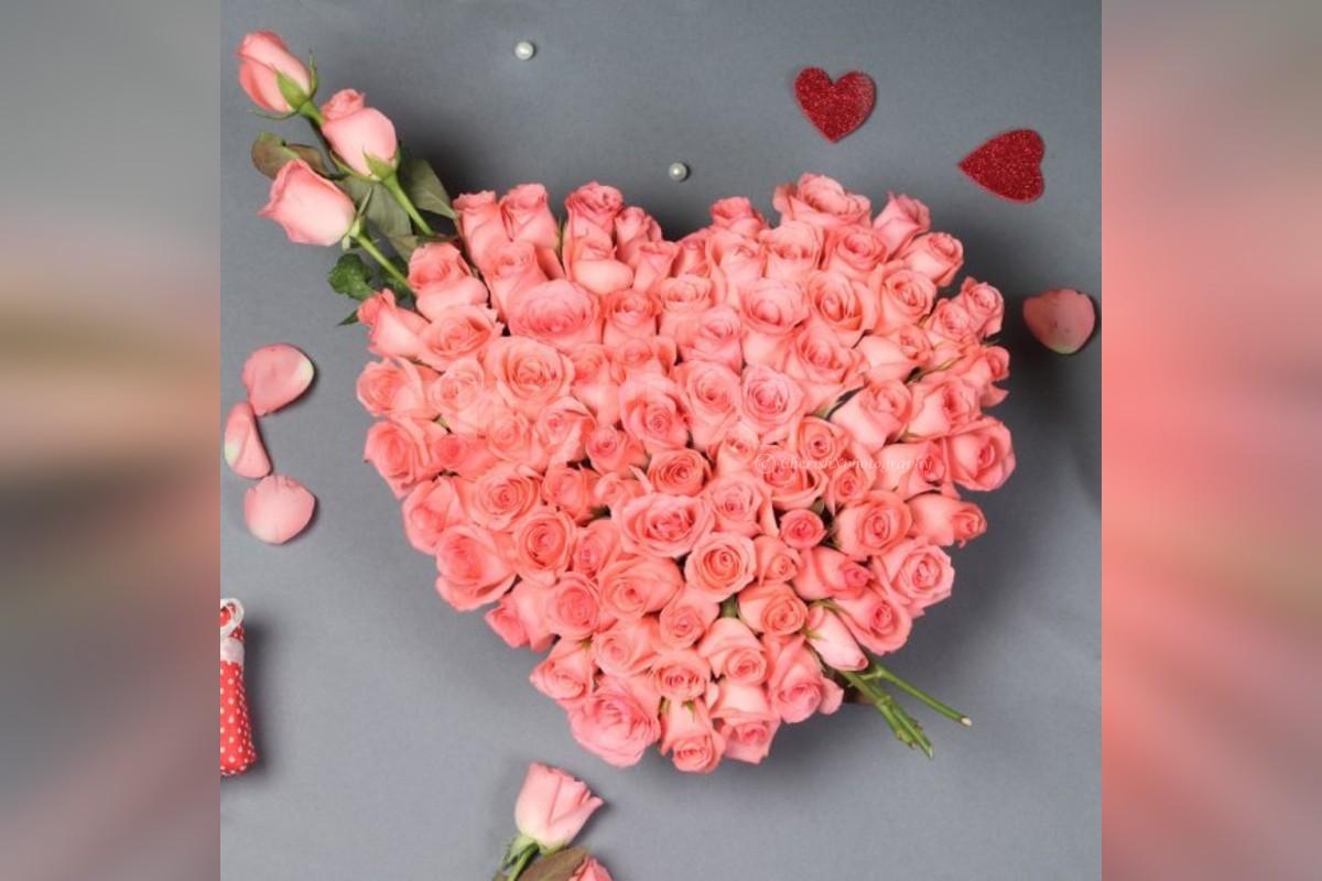 A Beautiful 50 Pink roses heart arrangement