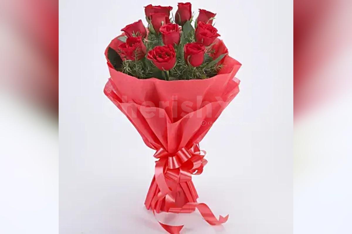 10 red roses with pineapple cake (500 gms) delivery at home