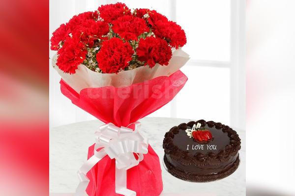 Red carnations with chocolate truffle cake