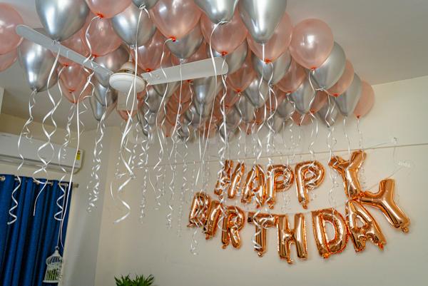 Rosegold and silver chrome balloon decoration by cherishx in delhi ncr