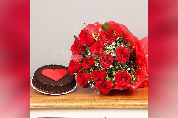 Send a simple 12 Red Rose with a delicious Chocolate Cake with a Red Heart.