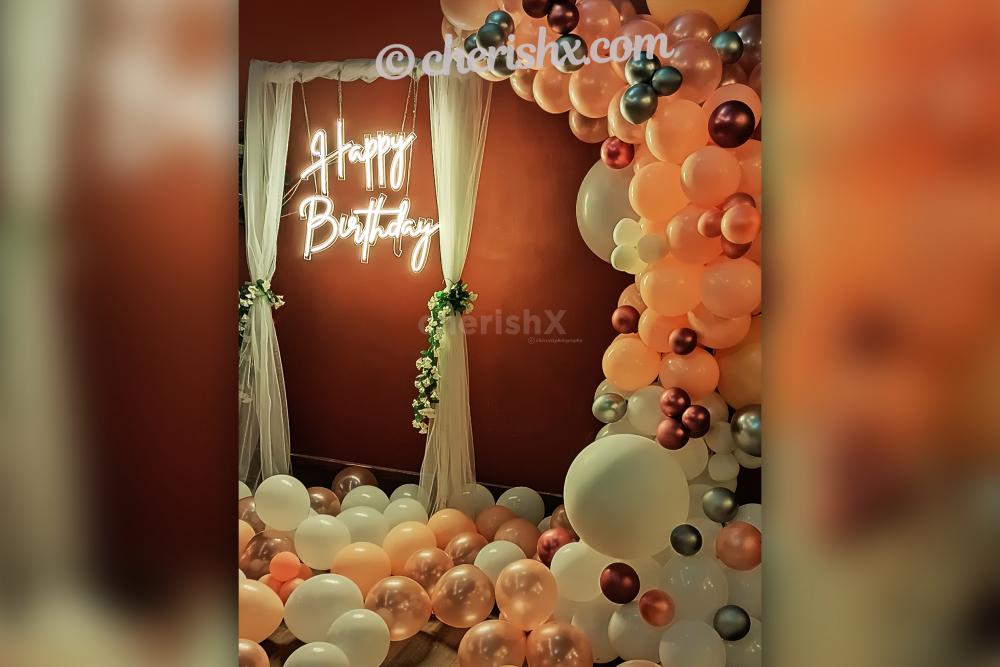 Add wonderful neon light decoration with pastel and chrome balloons to your birthday party