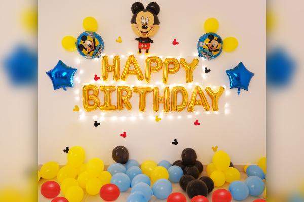 Celebrate your kid's birthday with a Famous Mickey Mouse Birthday Surprise decor!