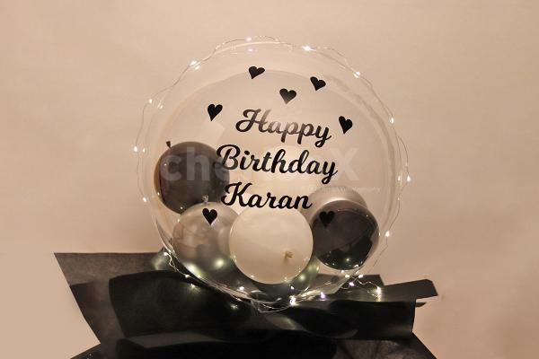 Get this big balloon bucket filled with many small balloons to surprise your love!