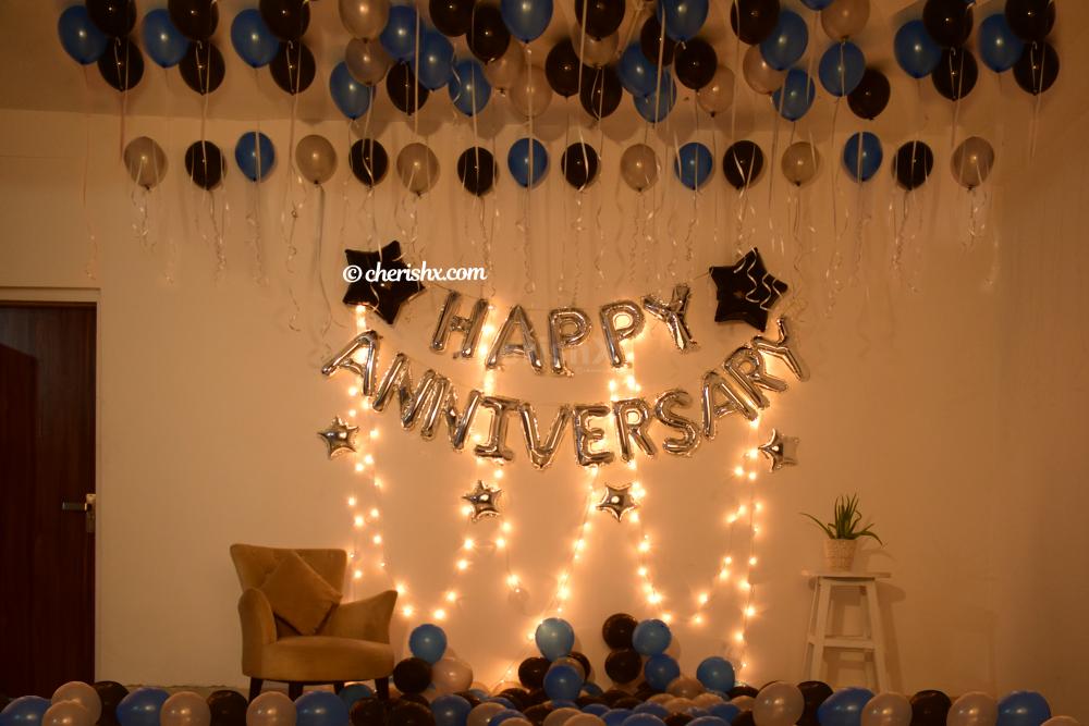 Make your close ones feel special with this elegant Blue & Silver Themed Anniversary Decor!