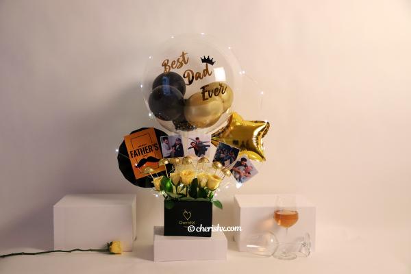 A Black & Gold Father’s Day Bucket with Balloons and Chocolates!