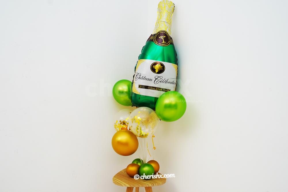 Green and Golden Confetti balloons put together with Champagne bottle balloon to give you the whole bunch.
