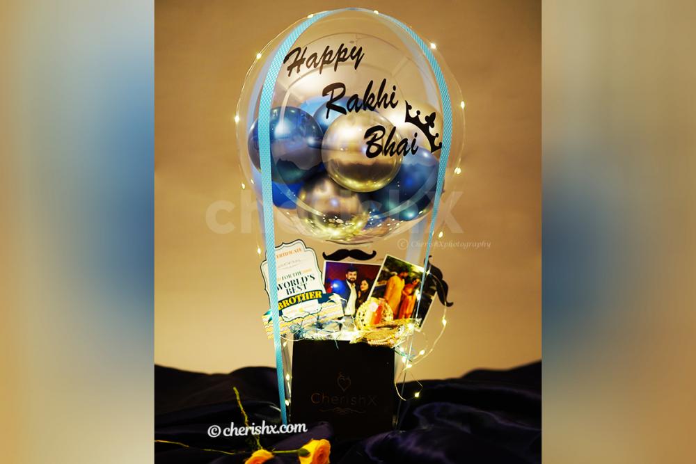 An elegant blue happy Rakhi Bhai Balloon Bucket.