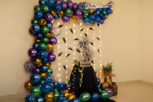 Get this peacock themed balloon decoration done for Janmashatami at the venue of your choice.
