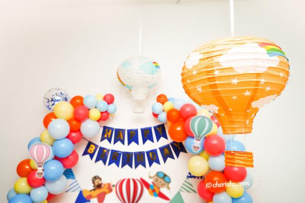 Arc of Colourful Balloons and parachute paper cut-out.