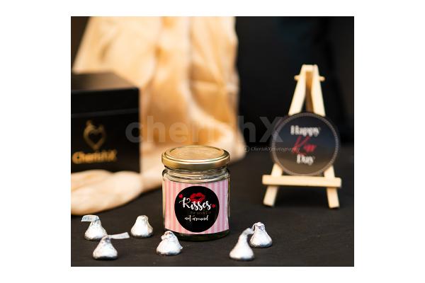 A Romantic Valentine's Countdown black box includes a beautiful jar of kisses for Chocolate Day