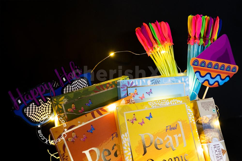 This Fascinating Holi Hamper has all the fun things for your Holi Celebration!
