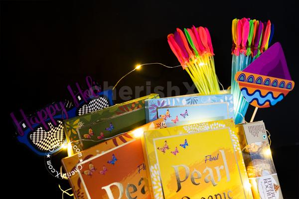 This Fascinating Holi Hamper has all the fun things for your Holi Celebration!