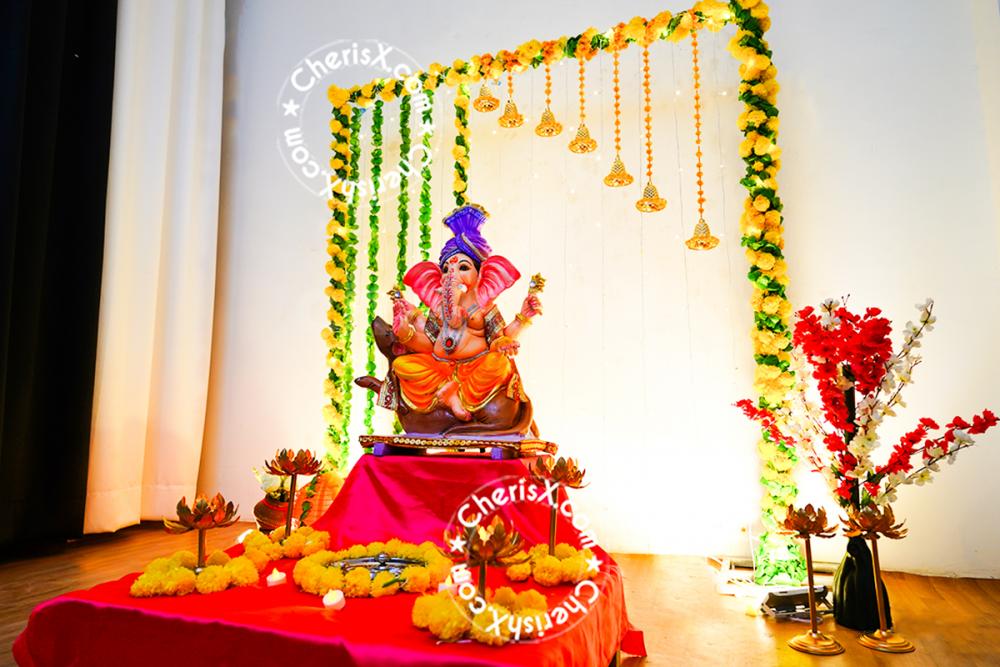 Celebrate Ganesh Chaturthi with our exclusive Ganesh Chaturthi Pandal Decoration in yellow and Green Colour theme.