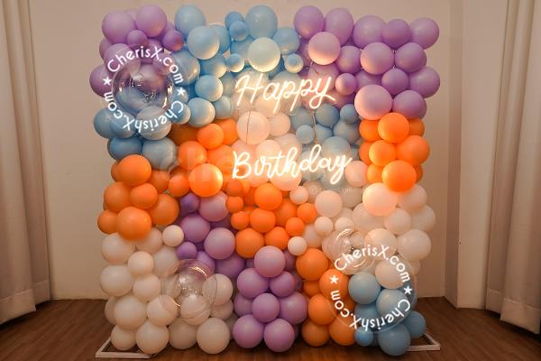 Add a new element of pastel and blue pastel balloons to tour birthday décor