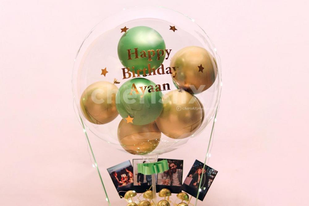 Startle your special one by gifting this beautiful Gold & Green Balloon Bucket with Chocolates!