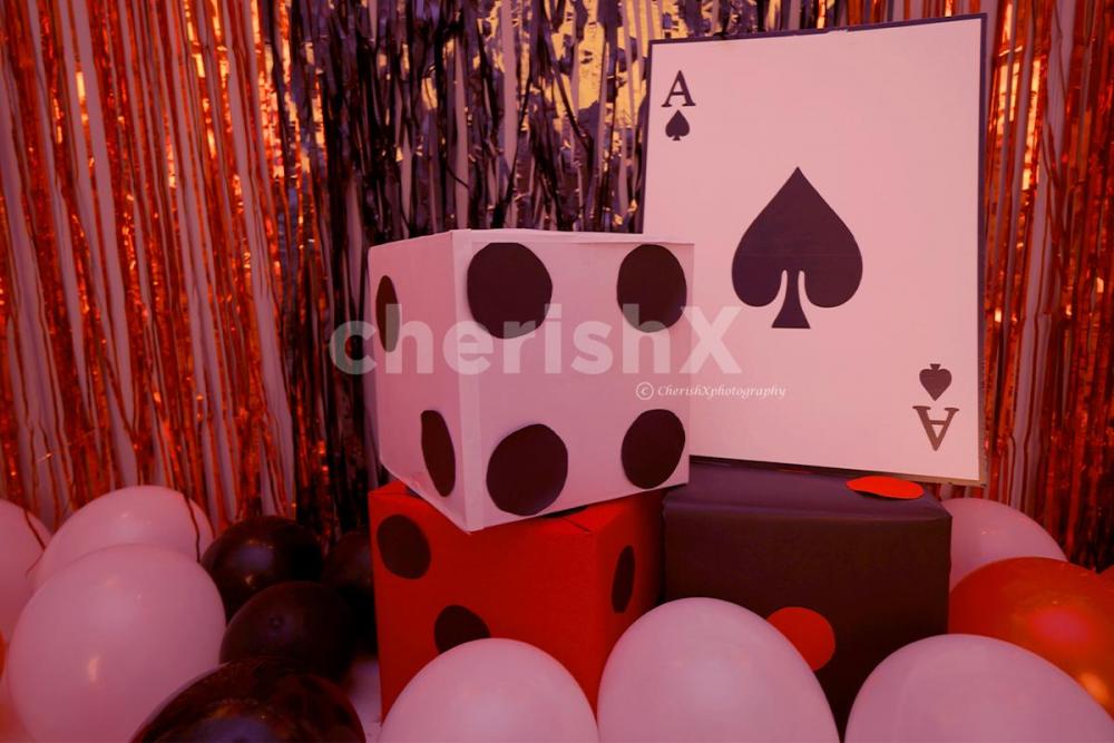 Book this Poker Theme Birthday Decor  and surprise everyone.