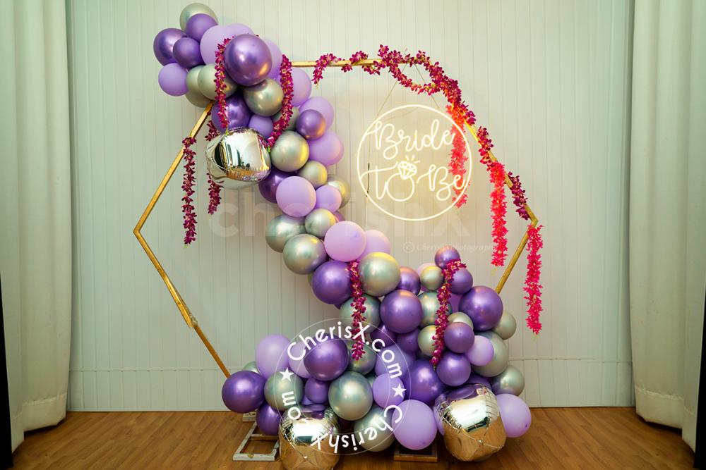 The large arch of colourful balloons makes for the perfect backdrop!