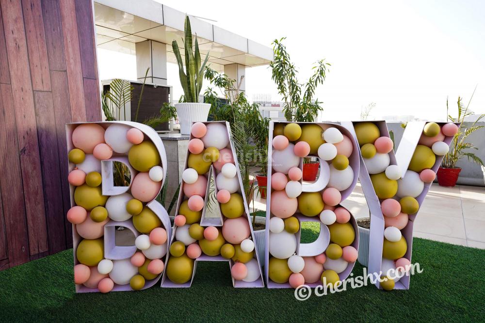 Throw a lovely Baby Shower for you close ones by booking CherishX's Peach Colored Baby Shower Decor !