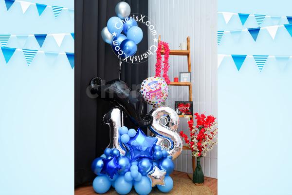 The blue and silver helium balloons on the bouquet are an outstanding addition
