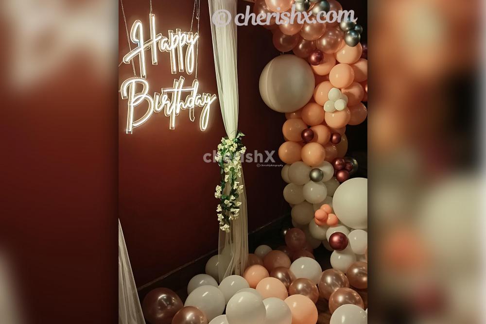Add wonderful neon light decoration with pastel and chrome balloons to your birthday party