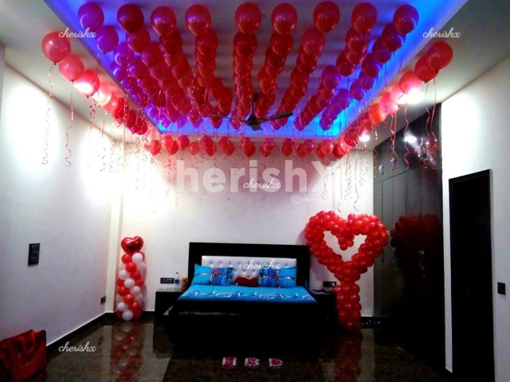 A Romantic Happy Wedding First Night Decoration with huge LOVE letters and  red, white balloons