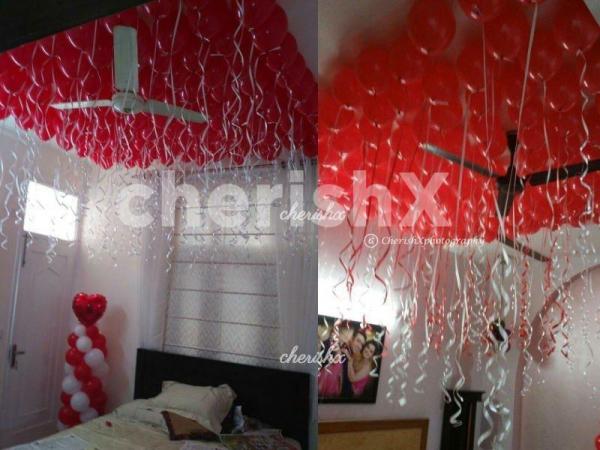 Red Balloons Tower with a Heart Shape Balloon on it