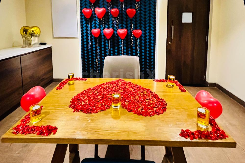 Rose petals and candles add to your sparkling night ambience