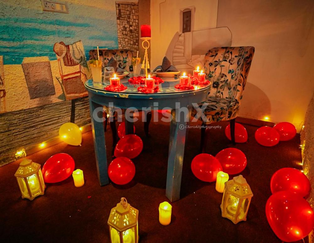 The decorations with roses and candles set the romantic vibe.