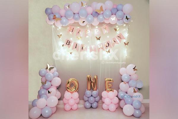 ONE Foil Balloon Letters in Golden to make the decor attractive!