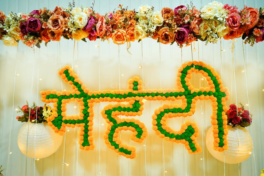 Celebrate Mehndi in style with stunning flowers and lanterns setup