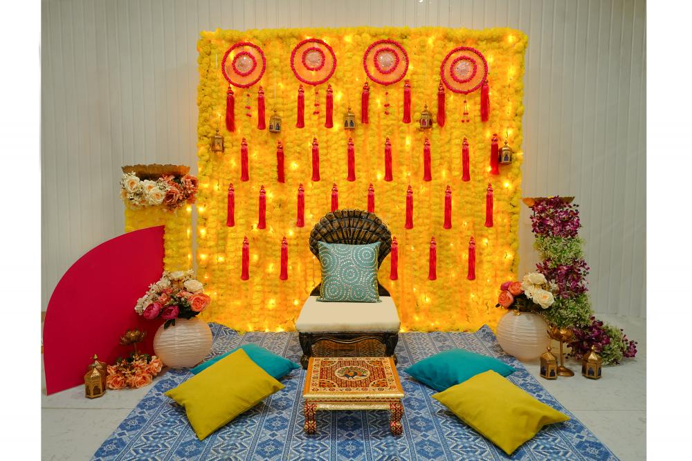 Create a stunning flower wall with our pink and yellow flower décor, perfect for pictures too