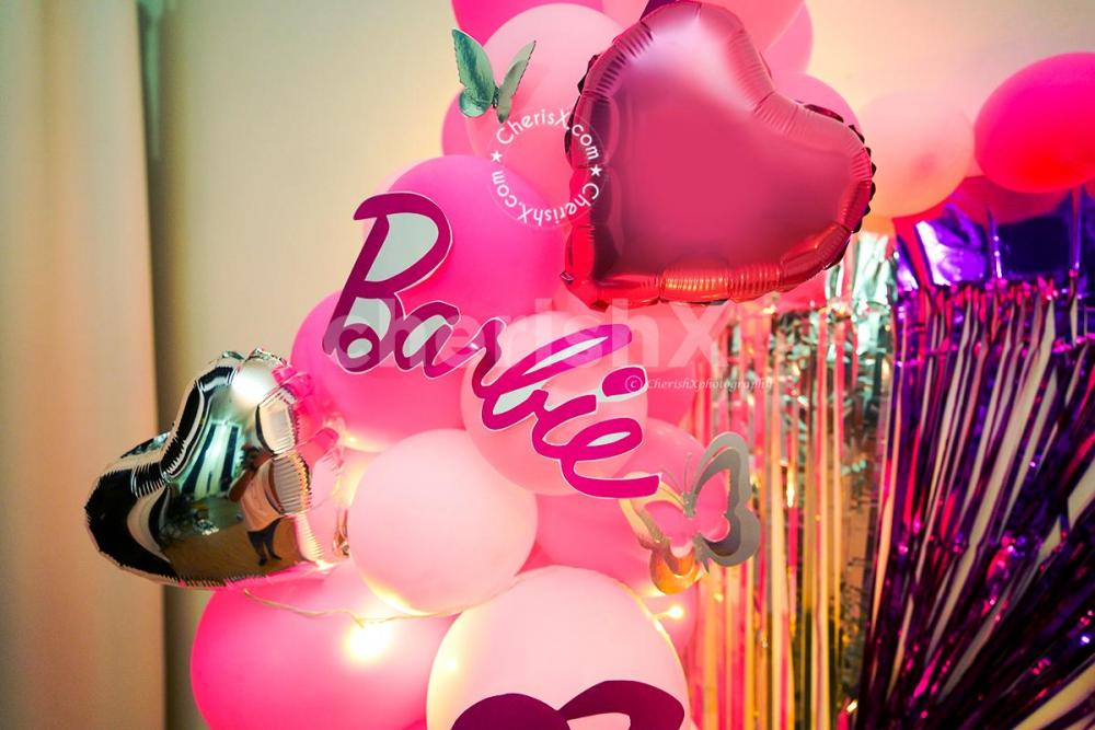 Celebrate your baby girl's birthday with CherishX's Barbie theme birthday decor!
