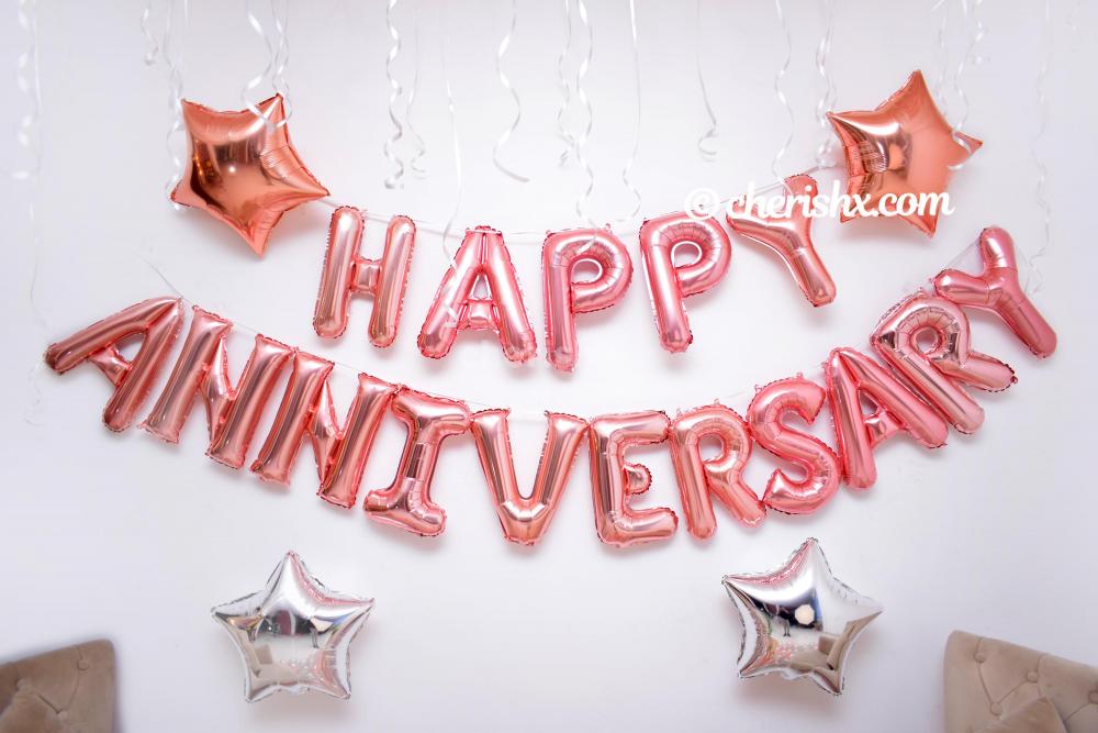 Book a beautiful Happy Anniversary Rose Gold Surprise Decor for your loved ones.