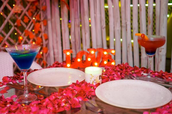 Unwind and relax with the soothing ambience of a big cabana candlelight dinner