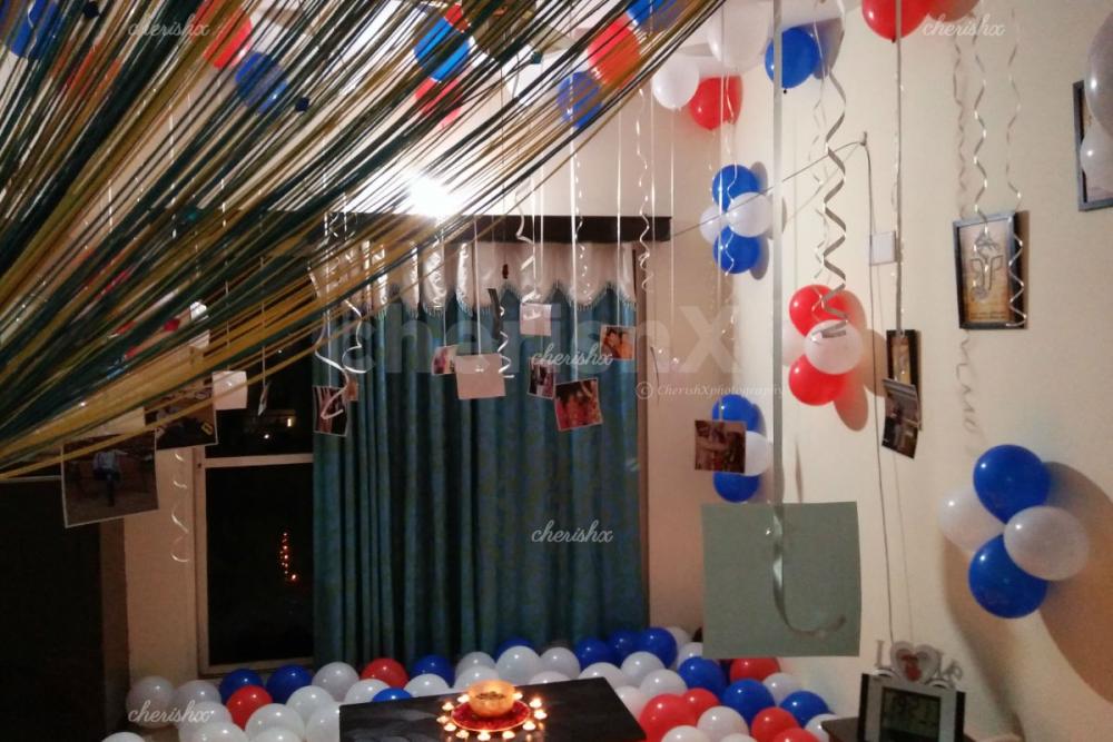 200 Balloon Decoration with ribbons and printed photos to celebrate wife's birthday