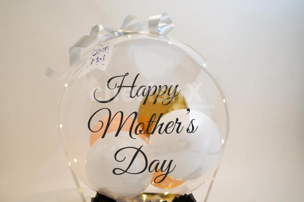 Your mother will admire the pleasant Flying Surprise Mother's Day Helium Bucket forever